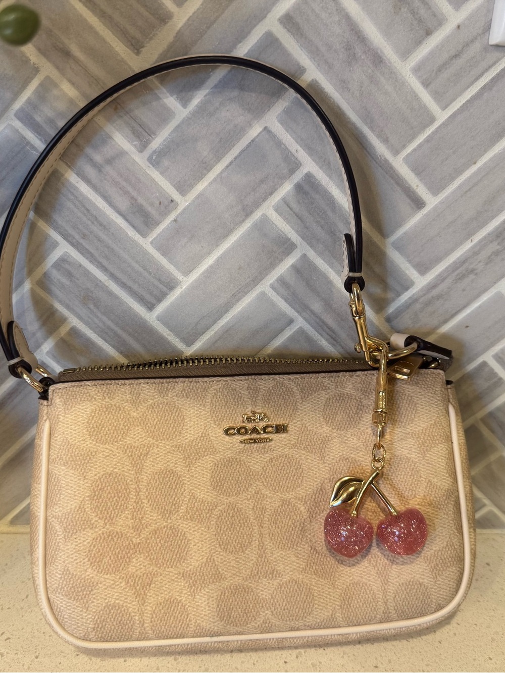 Coach Beige Signature Shoulder Bag with Pink Glitter Cherry Charm